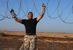 Free Picture of Installing Barbed Wire