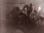 Free Picture of Man and Woman at a Spinning Wheel