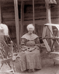 Free Picture of Woman and a Spinning Wheel