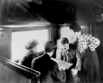 Free Picture of Men Playing Chess on a Train