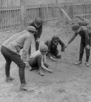 Free Picture of Boys Playing a Game of Marbles
