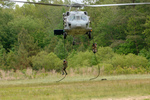 Free Picture of Soldiers Hanging on Ropes Under a Helicopter