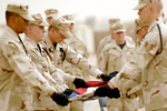 Free Picture of Honor Guardsmen Folding a Flag