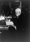 Free Picture of Andrew Carnegie Reading at a Desk