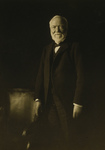 Free Picture of Andrew Carnegie Standing by a Chair