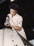 Free Picture of Riveter Woman Assembling an Airplane