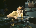 Free Picture of Riveter Operating a Riveting Machine