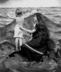 Free Picture of Mother and Child at the Beach