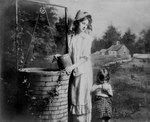 Free Picture of Woman and Daughter Fetching Water From a Well