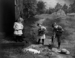 Free Picture of Children Burying a Pet Rabbit