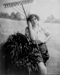 Free Picture of Woman With a Rake