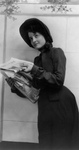 Free Picture of Woman Handing Out Newspapers