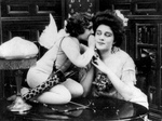 Free Picture of Cupid Whispering to a Woman