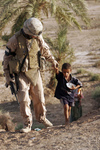 Free Picture of Soldier With an Iraqi Child