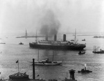 Free Picture of Ships Near the Statue of Liberty
