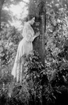 Free Picture of Helen Keller Resting Against a Tree