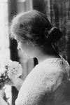Free Picture of Helen Keller Holding Flowers