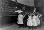 Free Picture of Students and Teacher at a Chalk Board