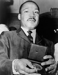 Free Picture of MLK Holding a Medallion