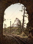 Free Picture of Train Tracks in a Tunnel and Matterhorn Mountain