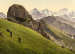 Free Picture of People on a Hillside Near the Swiss Alps Mountains