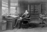 Free Picture of Charles Dickens Seated at a Desk