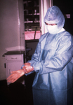 Free Picture of Doctor Putting On Marburg Fever Protective Gear
