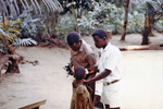 Free Picture of African Child Being Vaccinated for Measles and Smallpox in a Relief Camp Outside of a War Zone in Nigeria