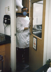 Free Picture of Virologist Entering a Biosafety Level-4 laboratory - 1975