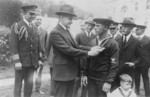 Calvin Coolidge Afixing a Medal on Augustus Butler Rowland