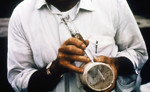 Researcher Discharging Mosquitoes from the Catch-Tube of a Hand-Held Mechanical Aspirator
