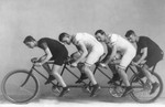 Four Men on a Quad Bike