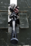 Soldier Looking Through 249B Machine Gun